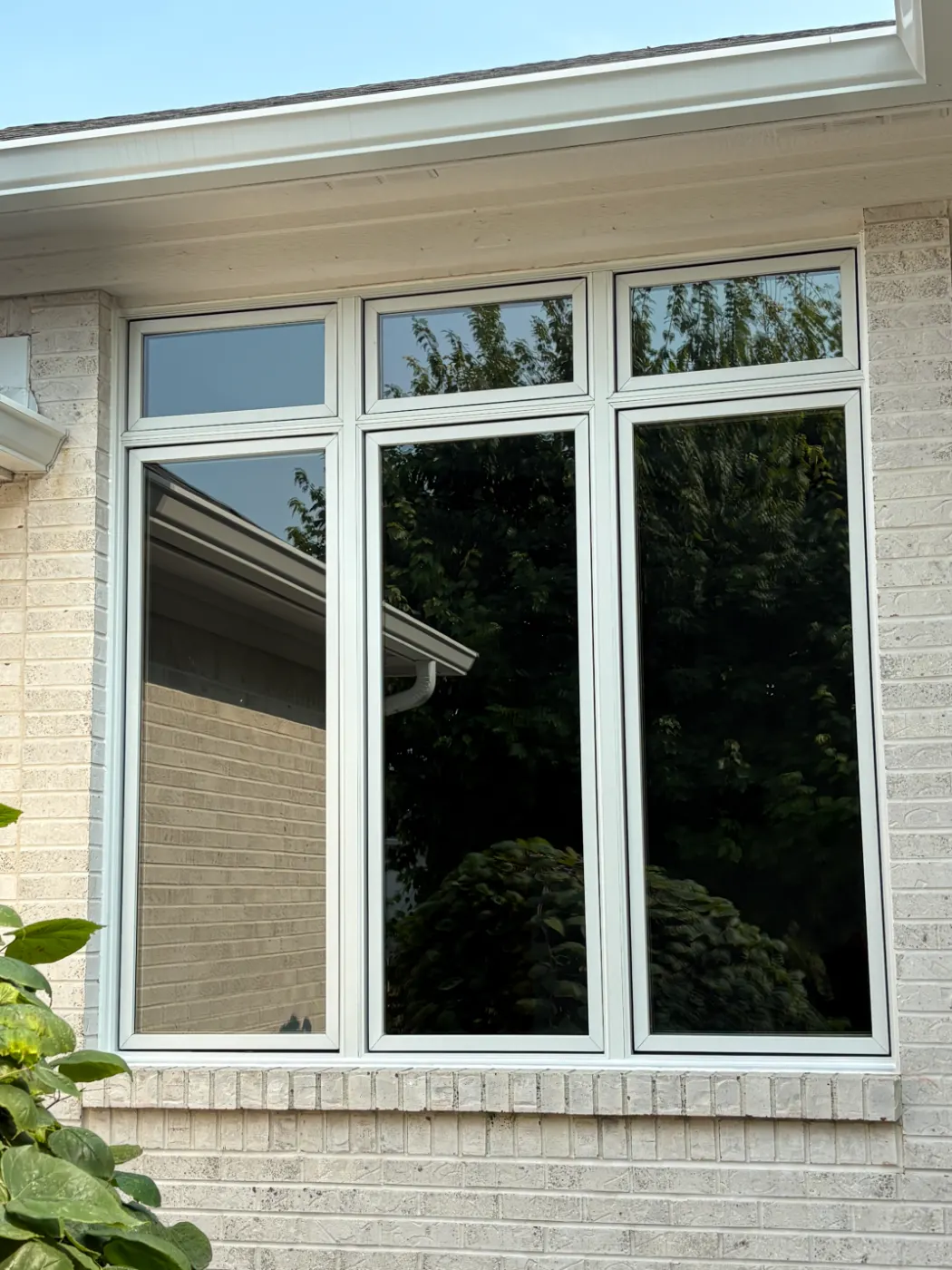 Storm-damaged window documented in Knightstown